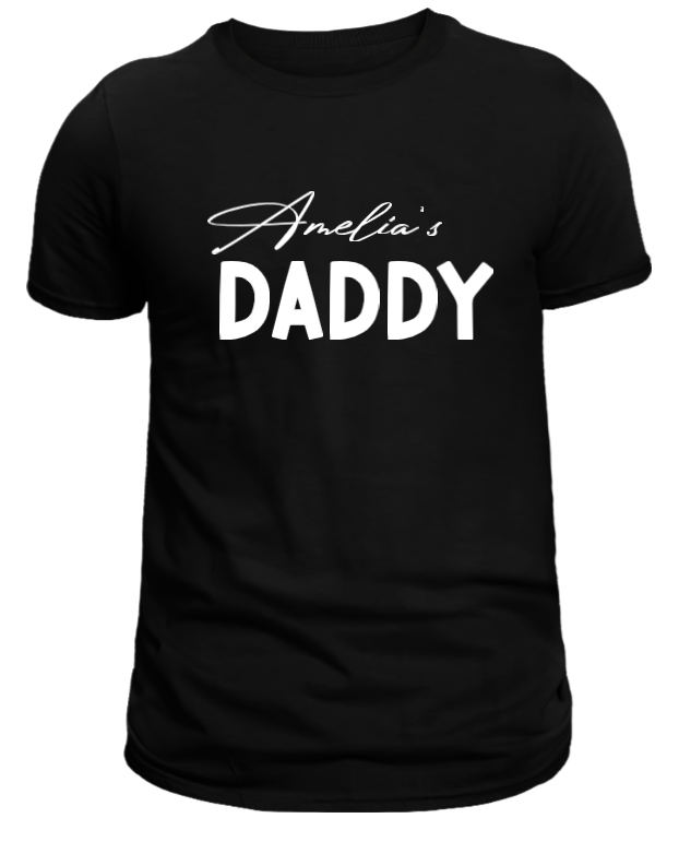 A black T-shirt with the text 'Amelia's DADDY' in white script.