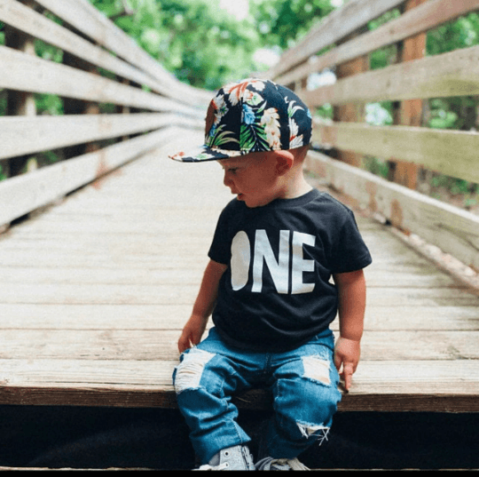 Kid Distressed Jeans with young boy sitting on bridge with One Shirt