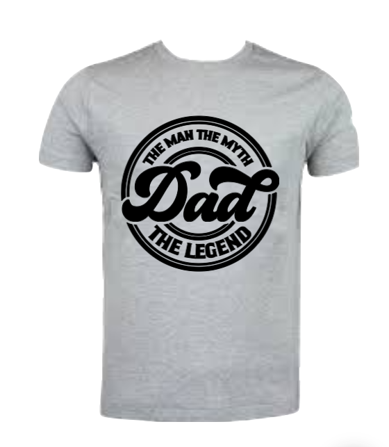 A black crew neck t-shirt with the text 'Dad' and 'The Man, The Myth, The Legend' arranged in a circular formation in white and grey gradient colors.
