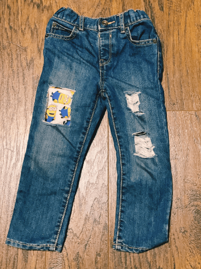 Distressed/Ripped Minions Skinny Jeans - Uneek Boutique by Dee