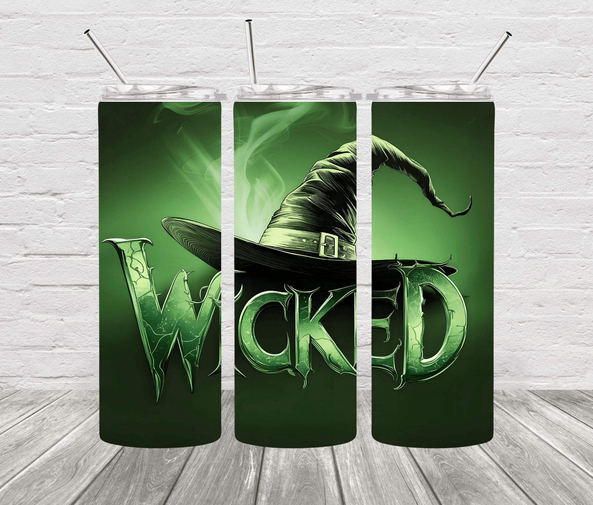 A 20oz stainless steel tumbler with a design featuring the character Elphaba from the musical 'Wicked'. The tumbler is green with a black hat design and the text 'WICKED' prominently displayed.