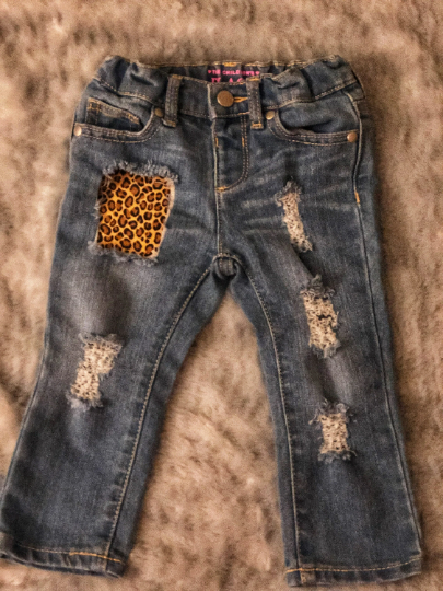 Distressed/Ripped Leopard Skinny Jeans